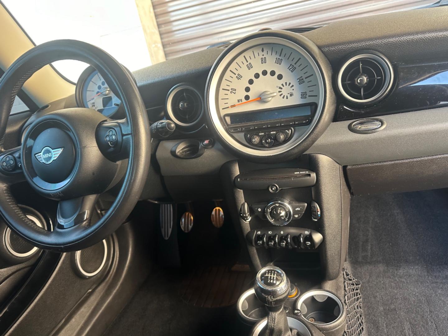 2012 Black /Black Mini Cooper Cloth (WMWSV3C52CT) with an 4Cylinder engine, Manual transmission, located at 30 S. Berkeley Avenue, Pasadena, CA, 91107, (626) 248-7567, 34.145447, -118.109398 - Tank : 13.20 Anti-Brake System : 4-Wheel ABS Steering Type : Rack and Pinion Front Brake Type : Disc Rear Brake Type : Disc Turning Diameter : 35.10 Front Suspension : Ind Rear Suspension : Ind Front Spring Type : Coil Rear Spring Type : Coil Tires : 195/55R16 Front Headroom : 38.80 Re - Photo#21